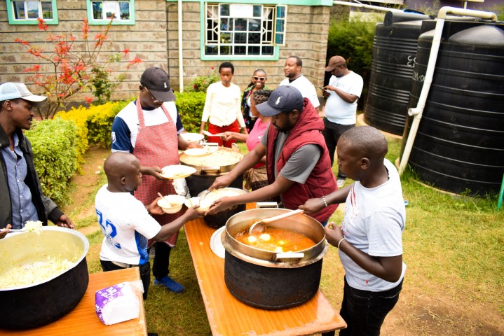 Volunteers serving food